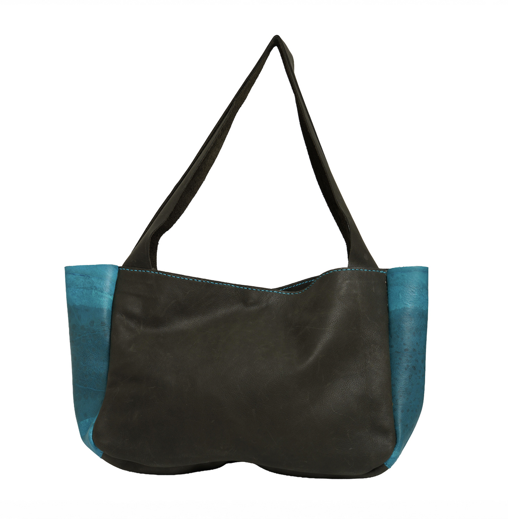 Black and blue handbag on a white background